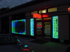 storefront for gil montie's tattoomania - beaumont, texa